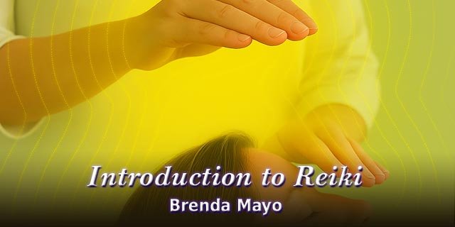 Hands gently hover above a person’s head with a soft yellow‑green glow, symbolizing Reiki energy, with a photo of Brenda Mayo on the left.